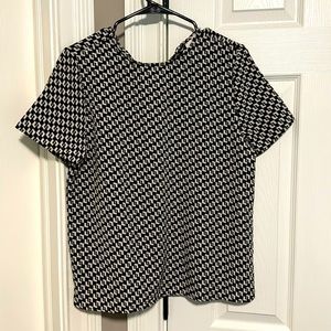 Oversized, black, and white blouse